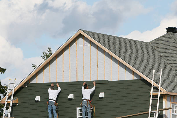 Professional Storm Damage Siding Repair technician working in Clinton, MD